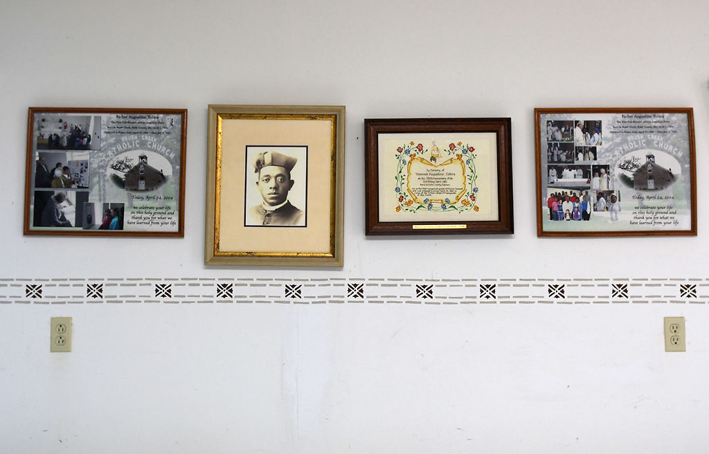 Memorabilia of Fr. Augustus Tolton hangs on the wall